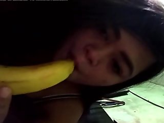 indo MILF bitch sucking a banana as if it were a dick